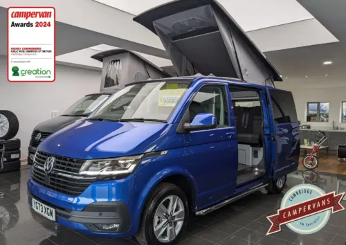 Photo of 2023 73 REG VW T6.1 HIGHLINE 204DSG, SWB, 4 MOTION, T32, TAILGATE – LED LIGHTS, REAR CAMERA, DETACHABLE TOWBAR, CARPETED CAB – BRAND NEW CAMPERVAN CONVERSION