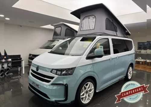 Photo of 2025 75 REG VW T7 150PS 8SP AUTO COMMERCE SWB BARN DOORS – TWO TONE CLEAR WHITE/STONE BLUE – BRAND NEW CAMPERVAN CONVERSION – MOBIFRAME 112CM SLIDING BED