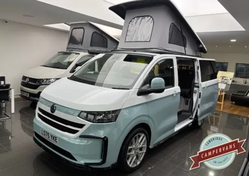Photo of 2025 75 REG VW T7 150PS 8SP AUTO COMMERCE SWB BARN DOORS – TWO TONE CLEAR WHITE/STONE BLUE – BRAND NEW CAMPERVAN CONVERSION – FIXED RIB BED