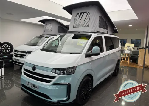 Photo of 2025 75 REG VW T7 150PS 8SP AUTO COMMERCE SWB BARN DOORS – TWO TONE CLEAR WHITE/STONE BLUE – BRAND NEW CAMPERVAN CONVERSION – FIXED RIB BED
