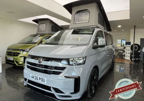 Photo of 2026 26 REG VW T7 150PS 8SP AUTOMATIC COMMERCE PRO SWB TAILGATE – LED EXCLUSIVE REAR LIGHTS, TOWBAR, T30, PARKING PACKAGE PREMIUM, CARPETED CAB – BRAND NEW FULLY-OFF GRID CAMPERVAN CONVERSION – STONE GREY