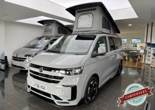 Photo of 2026 26 REG VW T7 110PS 6SP MANUAL COMMERCE PRO SWB TAILGATE – STANDARD CONVERSION – FIXED RIB BED – STONE GREY