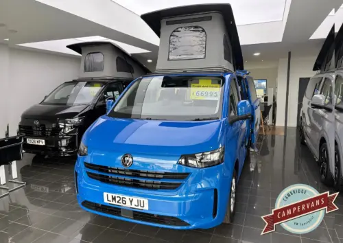 Photo of 2026 26 REG VW T7 170PS 8SP AUTO COMMERCE PRO SWB TAILGATE – STANDARD CONVERSION* – FIXED RIB BED – MID BLUE
